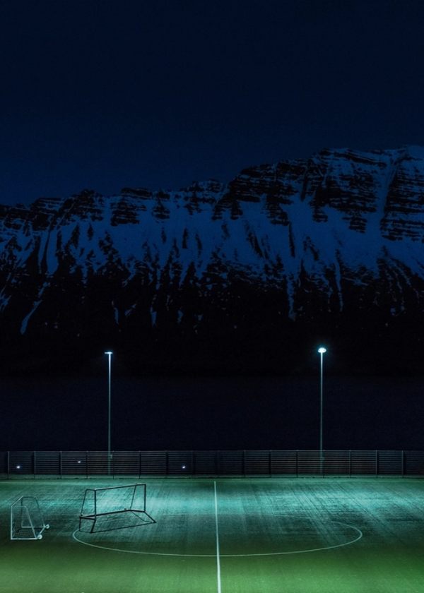 Live sports streaming — packed stadium under floodlights